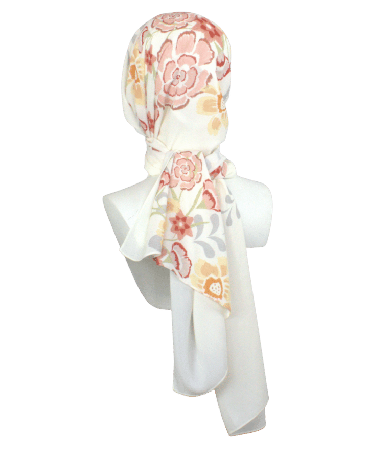 One-of-a-kind printed chiffon hijab styled with solid ivory side – refined and professional for workwear looks | Lina Zibdeh