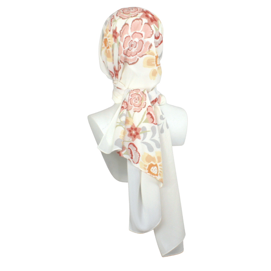 One-of-a-kind printed chiffon hijab styled with solid ivory side – refined and professional for workwear looks | Lina Zibdeh