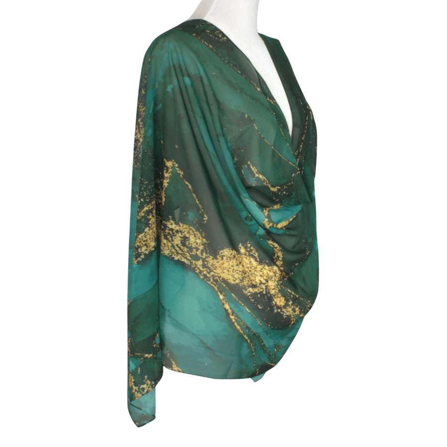 Elegant emerald chiffon hijab styled for Eid, weddings, and special celebrations