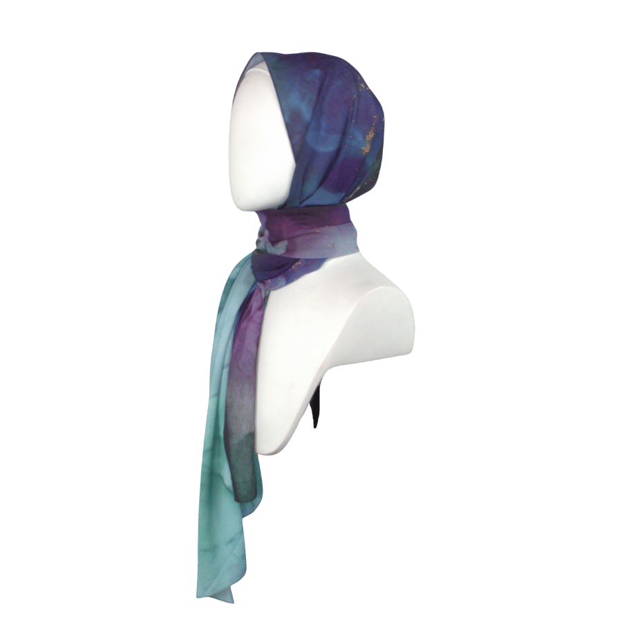 Chiffon hijab wrapped in simple everyday style highlighting jewel colors