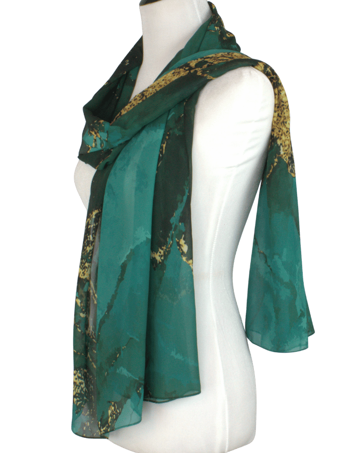 Lightweight emerald chiffon hijab styled with flowing drape for formal occasions