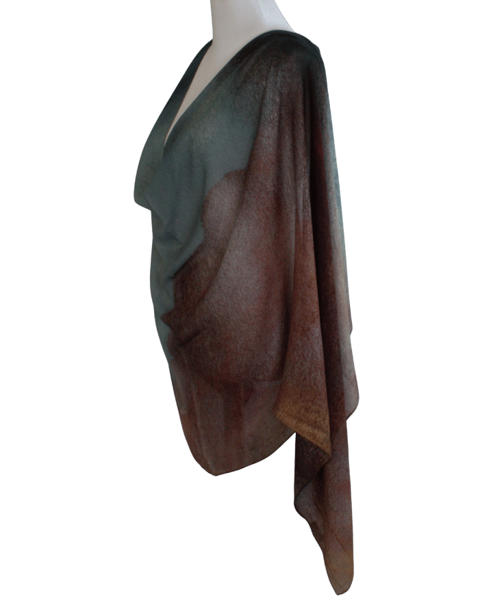 Mannequin wearing a draped brown and green bamboo modal on a transparent background