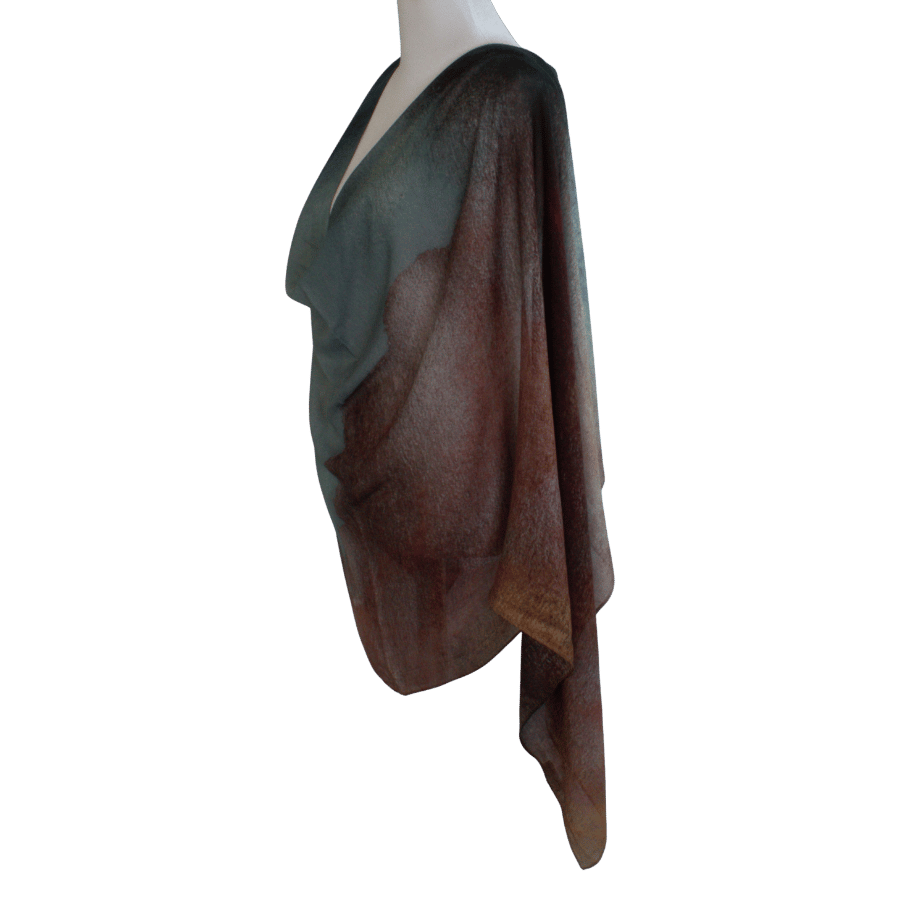 Mannequin wearing a draped brown and green bamboo modal on a transparent background