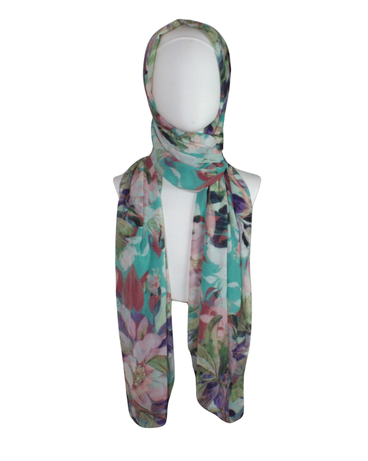 Premium foral hijab scarf for work and everyday. Colorful floral hijab scarf on a mannequin against a transparent background | Lina Zibdeh