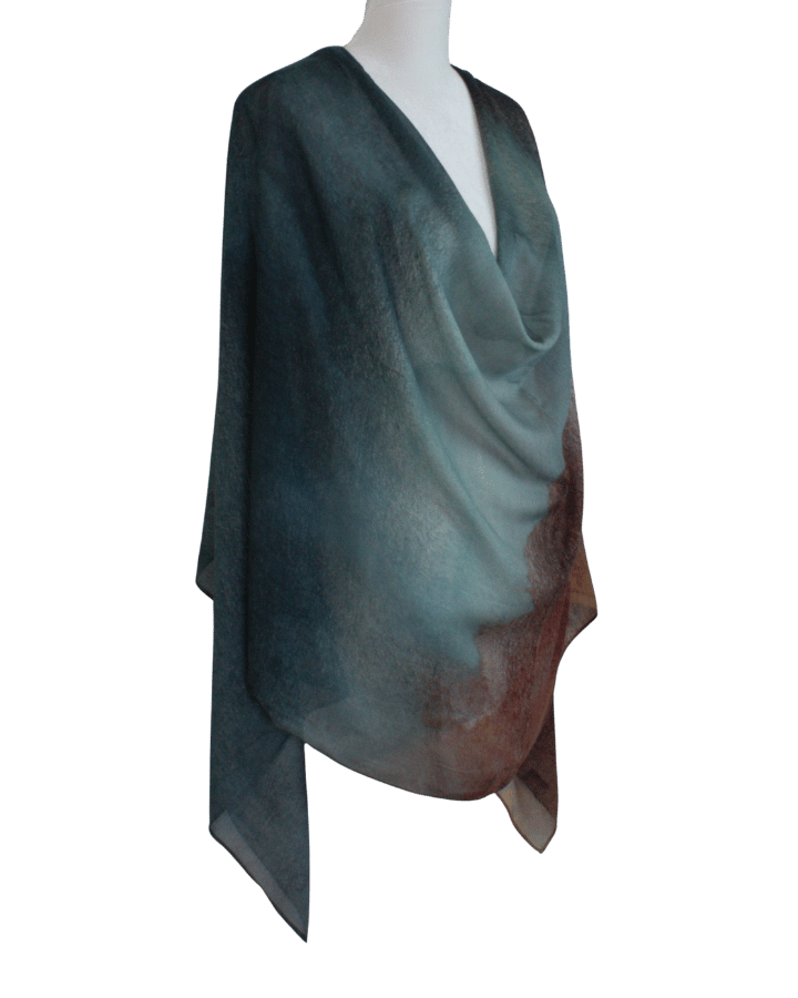 Teal-brown ombre printed bamboo modal hijab draped on a mannequin against a transparent background | Lina Zibdeh