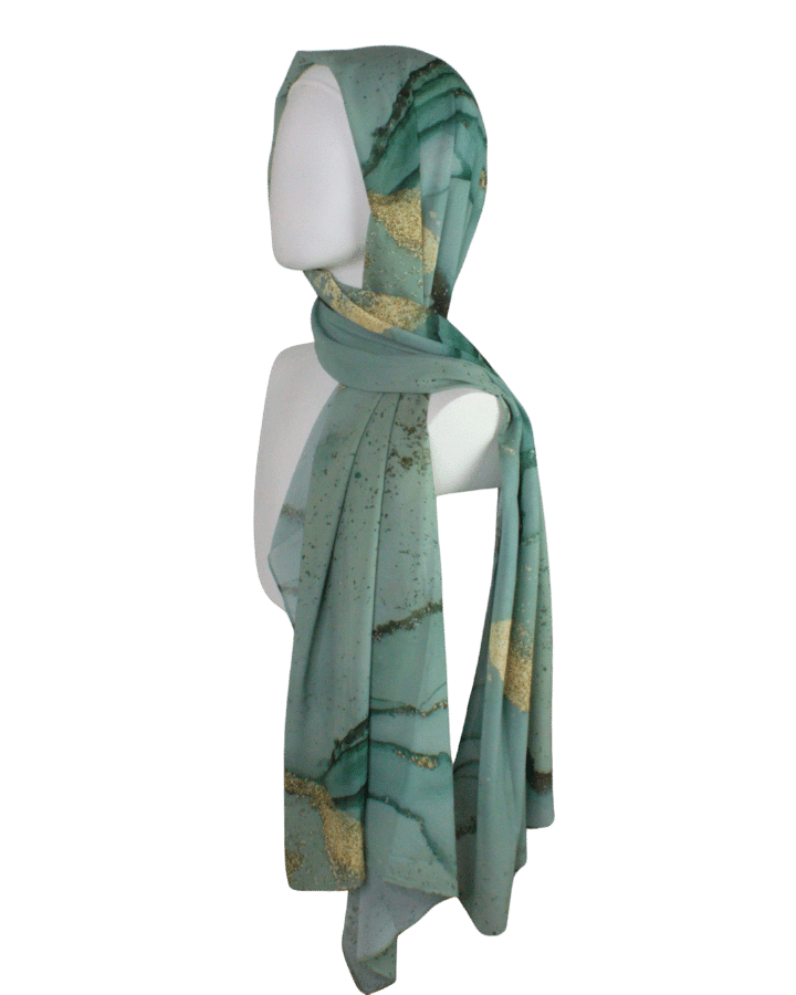 Fancy hijab in green and metallic gold for special occasions