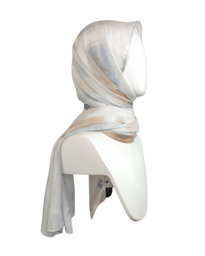 Lightweight bamboo modal hijab with airbrushed mocha and blue print laid on white background | Lina Zibdeh