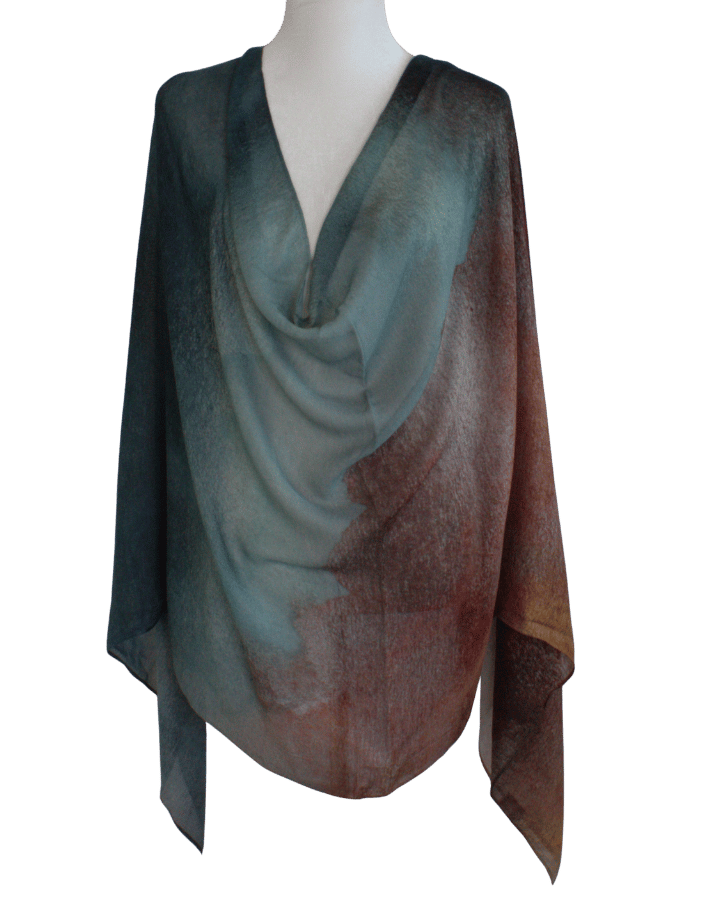 A front view of our designer printed ombre bamboo modal hijab scarf. A gradient of teal and chocolate brown hijab for women who want quality hijabs | Lina Zibdeh