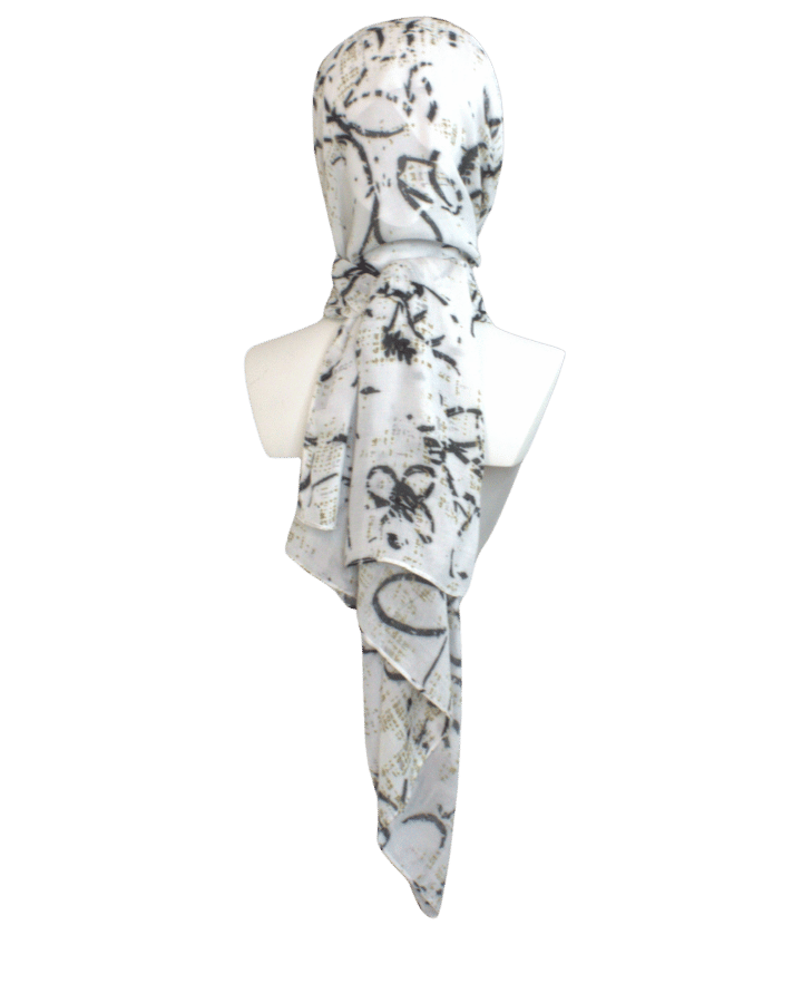 Printed bamboo modal hijab scarf, black floral print on a soft white background and bronze stripes. Ideal for work and hot weather | Lina Zibdeh