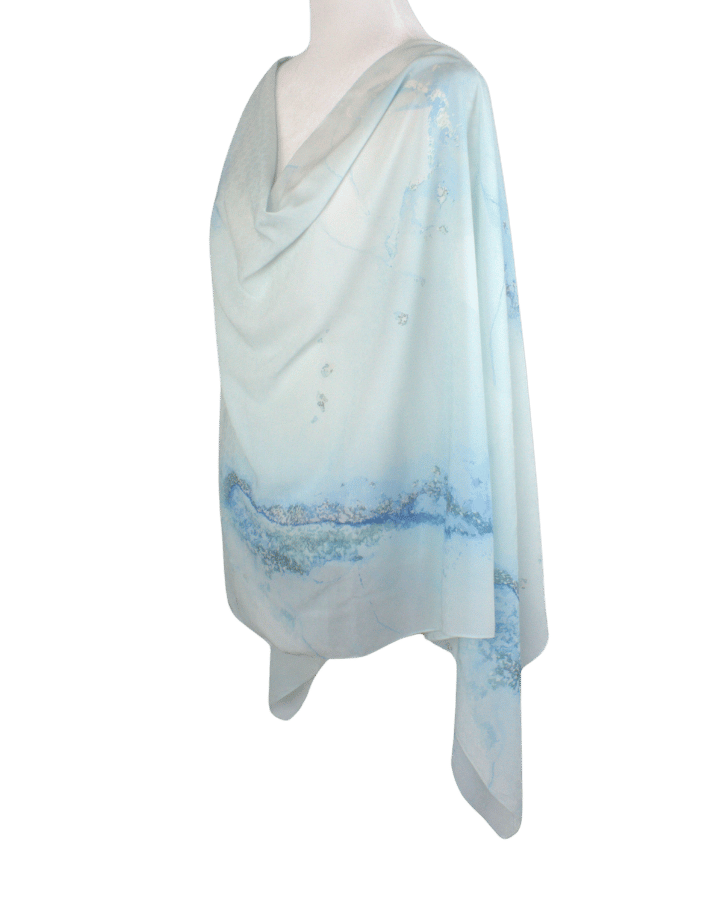 An elegant light blue designer print hijab headscarf for work and everyday. Ideal for summer and professional settings. Lina Zibdeh