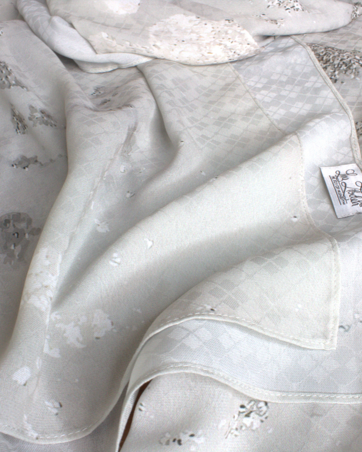 Fancy silver hijab scarf in textured chiffon with a perfect balance of matte and sheen to it, ideal for special occasions and work. A better grip, soft and easy to wrap. | Lina Zibdeh