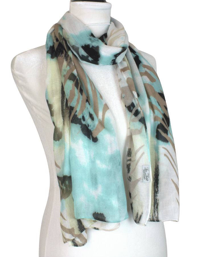 Lightweight and non-slip bamboo modal hijab with animal pattern in turquoise green and black and beige, unique designer hijab print for women who want high end breathable fabrics | Lina Zibdeh
