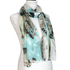 Lightweight and non-slip bamboo modal hijab with animal pattern in turquoise green and black and beige, unique designer hijab print for women who want high end breathable fabrics | Lina Zibdeh