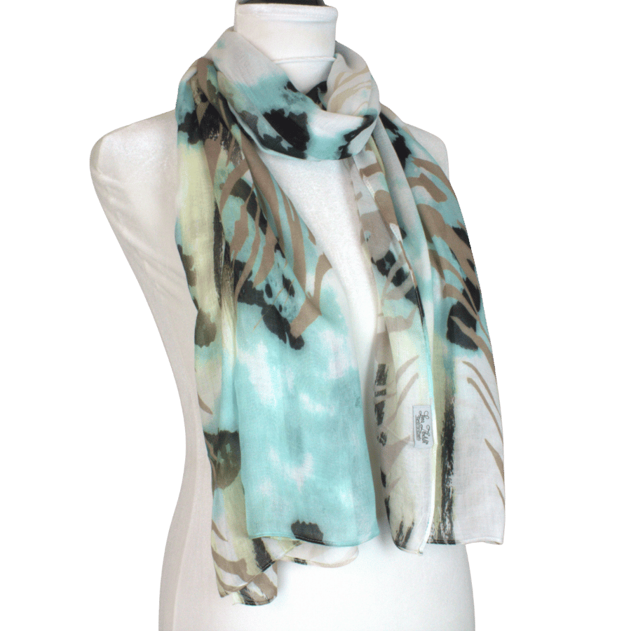Lightweight and non-slip bamboo modal hijab with animal pattern in turquoise green and black and beige, unique designer hijab print for women who want high end breathable fabrics | Lina Zibdeh