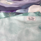 Close-up of edges and stitching on premium chiffon hijab for quality detail