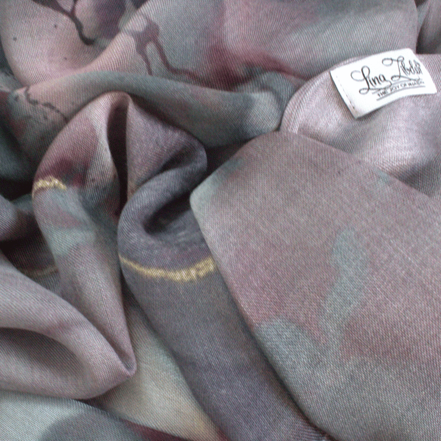 Close-up of a fabric with a brand label on a textured background