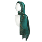 Emerald golden chiffon hijab wrapped in simple everyday style highlighting its versatile design