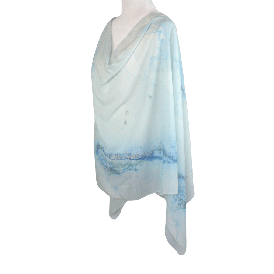 An elegant light blue designer print hijab headscarf for work and everyday. Ideal for summer and professional settings. Lina Zibdeh