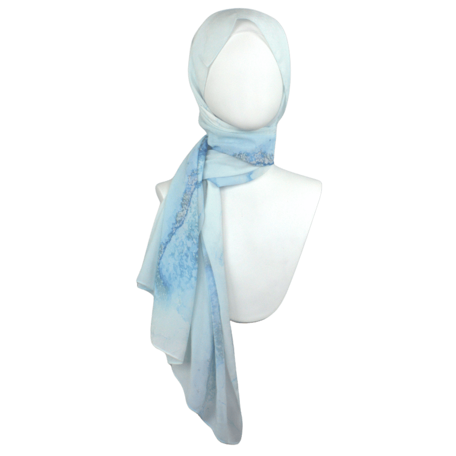 Fancy light blue designer print hijab headscarf for work and everyday. Ideal for summer and professional settings. Lina Zibdeh