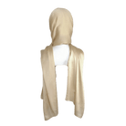 A golden satin crinkle hijab displayed on a mannequin head | Lina Zibdeh
