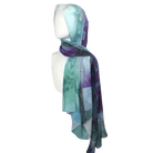 Watercolor jewel-toned chiffon hijab displayed to show soft drape and elegant print.