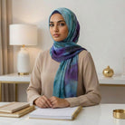 Model showcasing chiffon hijab in artistic watercolor print for work styling